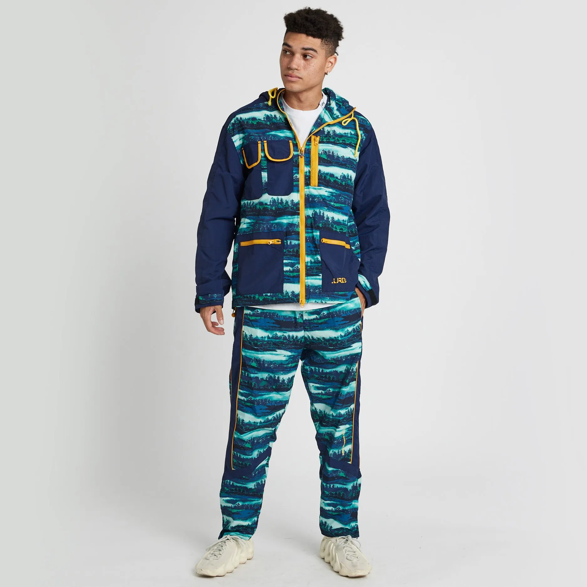 ELEVATED WOODS WINDBREAKER JACKET - NAVY