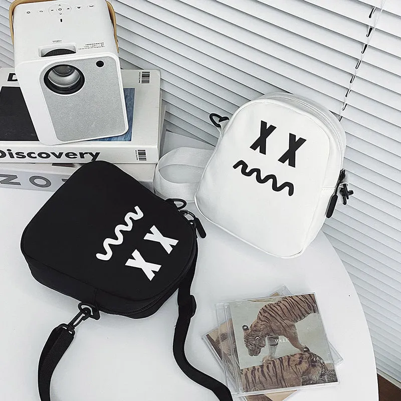 Fashionable Black, White Fear Expression Canvas Crossbody Bag